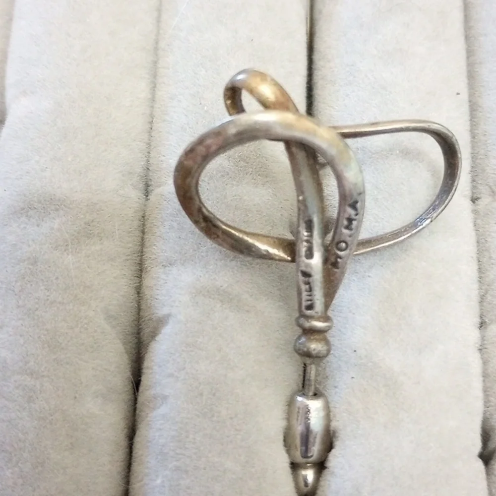 Vintage calla lily flower pin marked MoMA and sterling